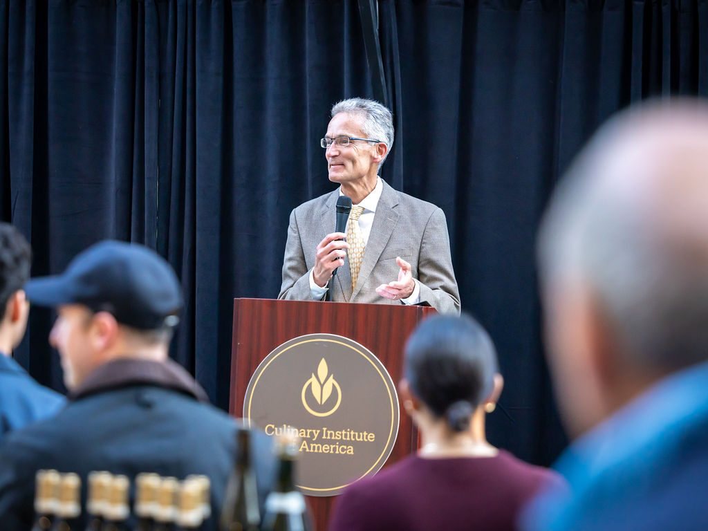Opening remarks at the Culinary Institute of America podium