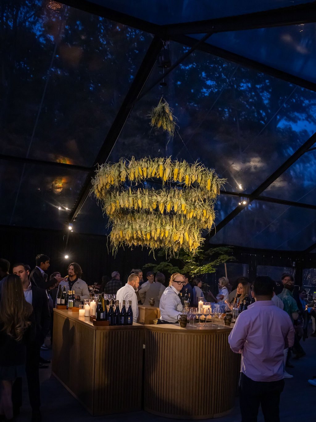 The corn-husk chandelier at night
