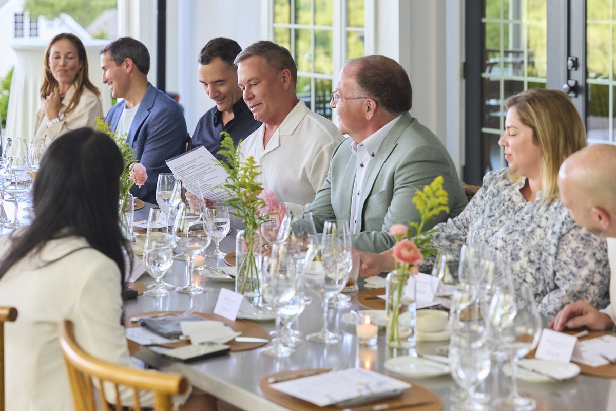Guests sharing lunch around a table